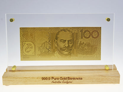 GOLD $100 BANK NOTE - WOODEN BASE