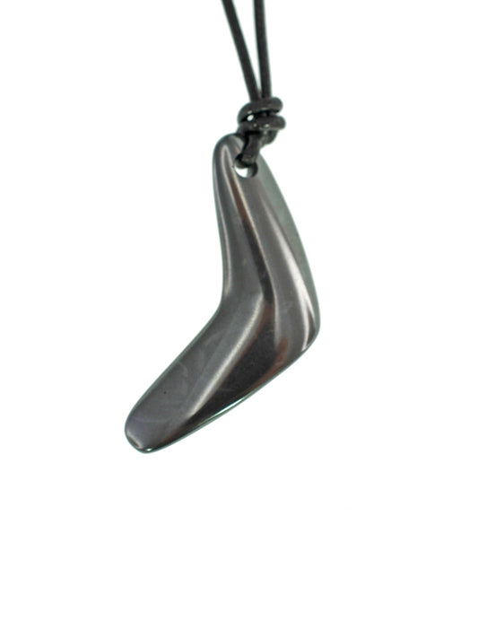IRON ORE BOOMERANG ON LEATHER